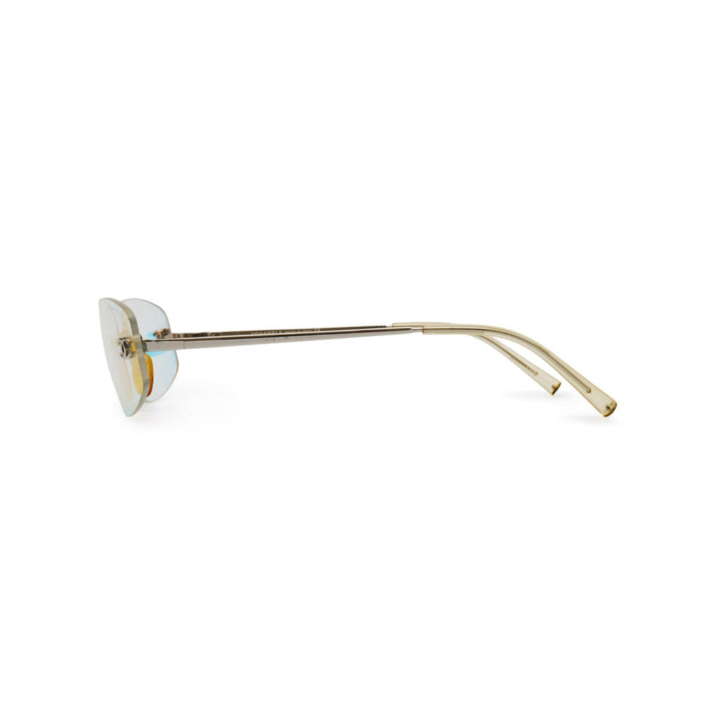 Chanel rimless sunglasses with sleek, modern design and tinted lenses, stylish eyewear for a sophisticated look.