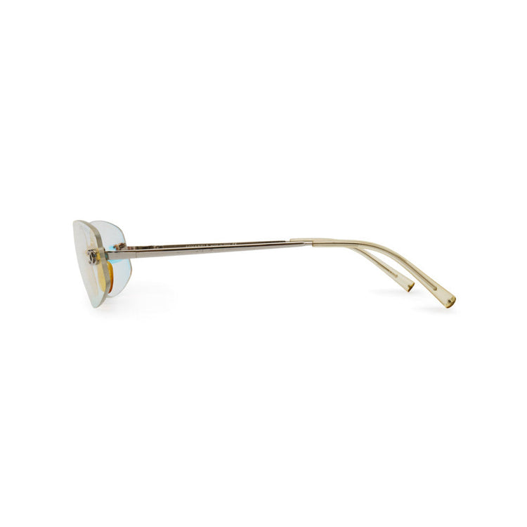 Chanel rimless sunglasses with sleek, modern design and tinted lenses, stylish eyewear for a sophisticated look.
