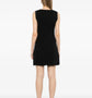 Chanel sleeveless Camellia wool dress featuring a fitted silhouette and elegant floral embroidery on soft wool fabric.