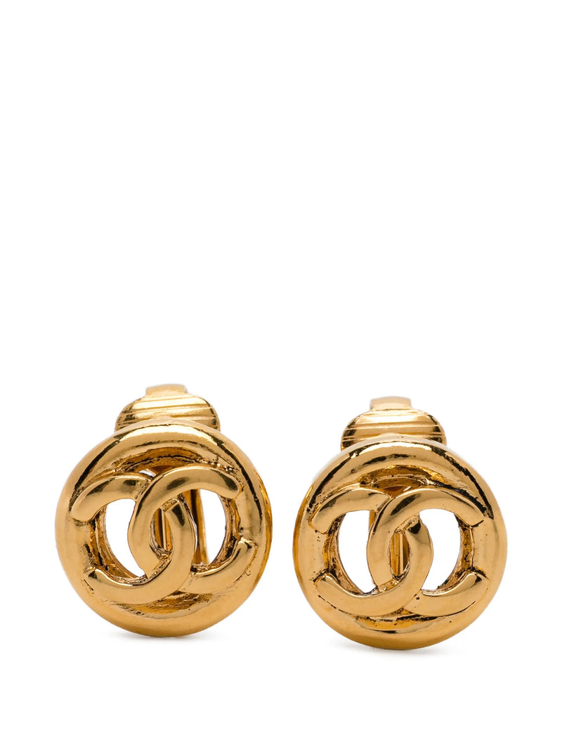 Chanel small gold emblem clip-on earrings with signature logo design on shiny gold finish