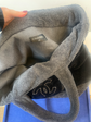 Chanel terry cloth tote bag with soft fabric handles and spacious interior, stylish accessory for everyday use.