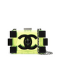 Translucent yellow-green Chanel Lucite Lego minaudière clutch with geometric design and compact size, perfect for evening accessories.