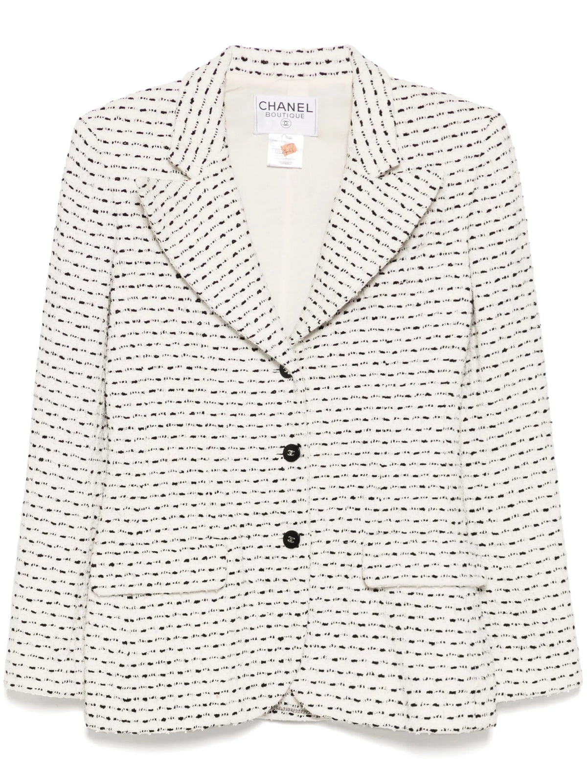 Chanel monochrome blazer in textured black and white tweed, tailored blazer with classic collar and structured fit.