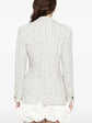 Chanel monochrome blazer in textured black and white tweed, tailored fit with lapel collar, stylish blazer for women