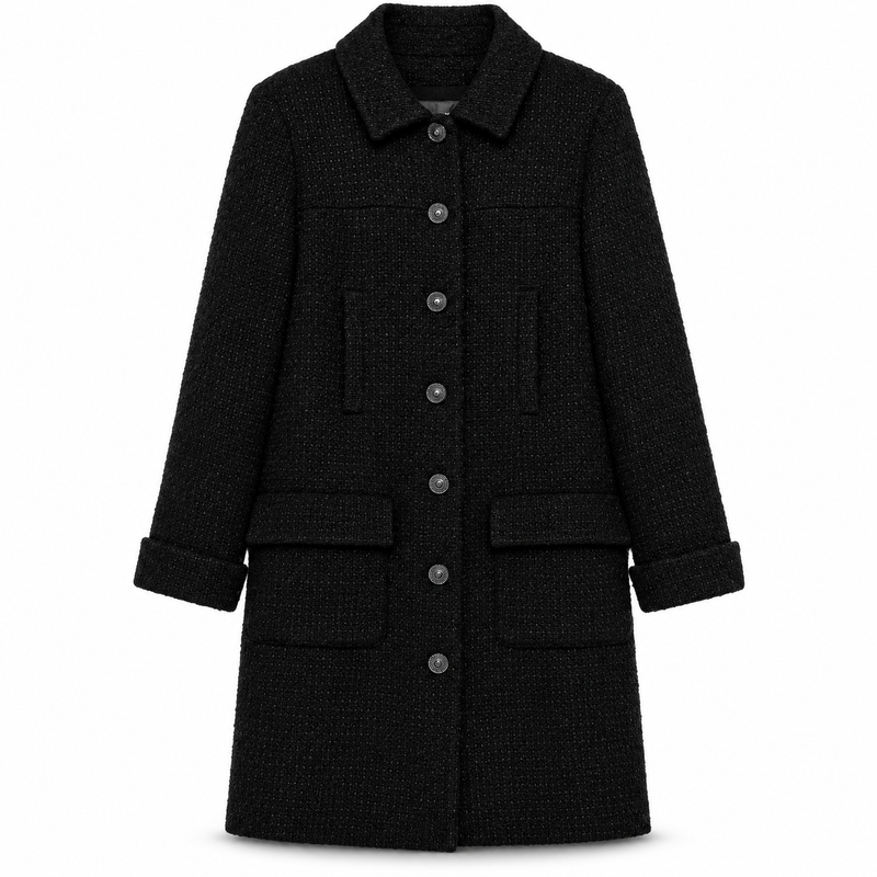 Chanel wool tweed coat with classic collar and tailored fit, displayed on a hanger against a neutral background.