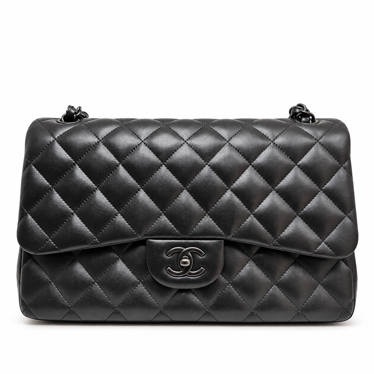 Chanel black quilted jumbo double flap shoulder bag made of crumpled lambskin with silver hardware, classic and stylish design
