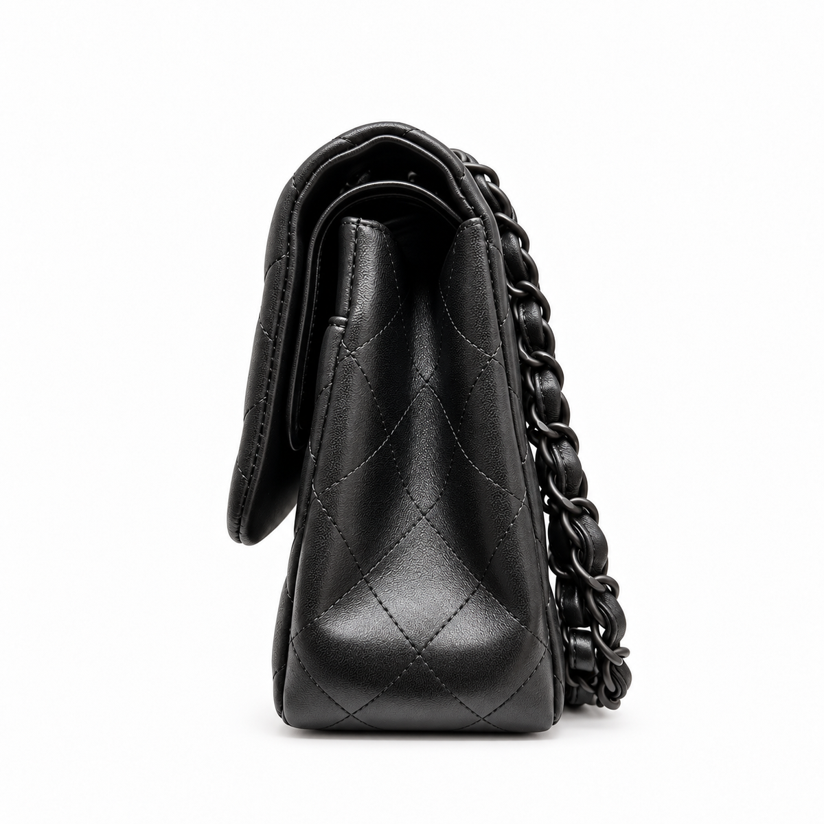 Black quilted jumbo double flap shoulder bag by Chanel featuring crumpled lambskin and signature chain strap.