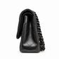 Black quilted jumbo double flap shoulder bag by Chanel featuring crumpled lambskin and signature chain strap.