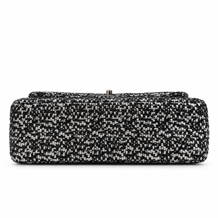 Silver tweed sequins Chanel shoulder bag with double flap design, featuring elegant craftsmanship and classic style.
