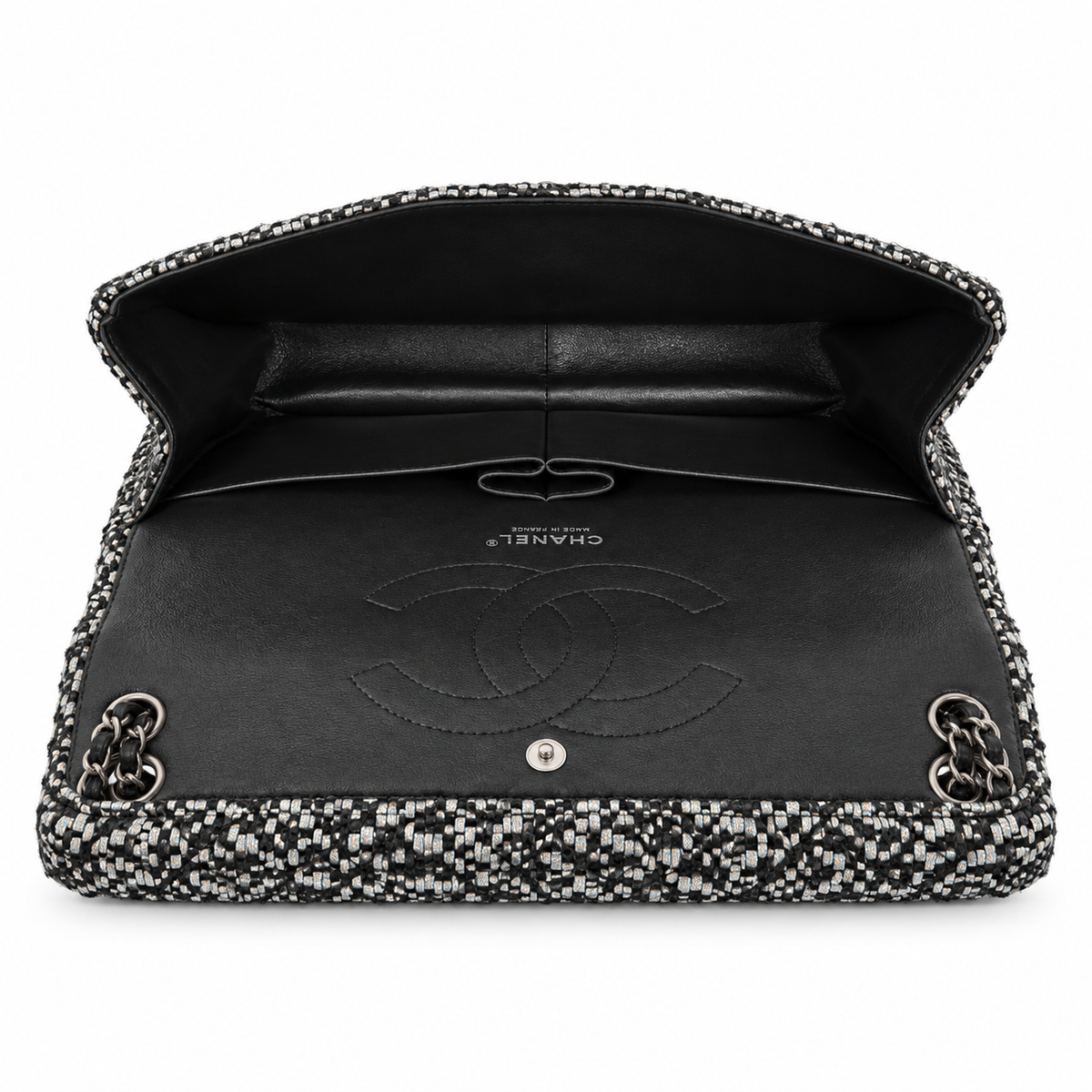 Silver tweed sequins Chanel jumbo double flap shoulder bag with silver hardware and chain strap.