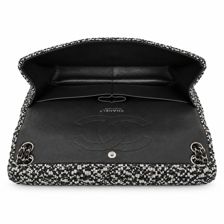 Silver tweed sequins Chanel jumbo double flap shoulder bag with silver hardware and chain strap.