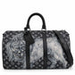 Louis Vuitton Chapman Brothers Keepall 55 Bandouliere travel bag in navy with lion print, featuring leather handles and adjustable strap.
