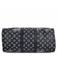 Louis Vuitton Chapman Brothers Keepall 55 Bandouliere travel bag in navy with lion design, featuring sturdy handles and shoulder strap.