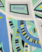 Emilio Pucci abstract print slip dress with vibrant, colorful patterns and flowing fabric, displayed on a mannequin.