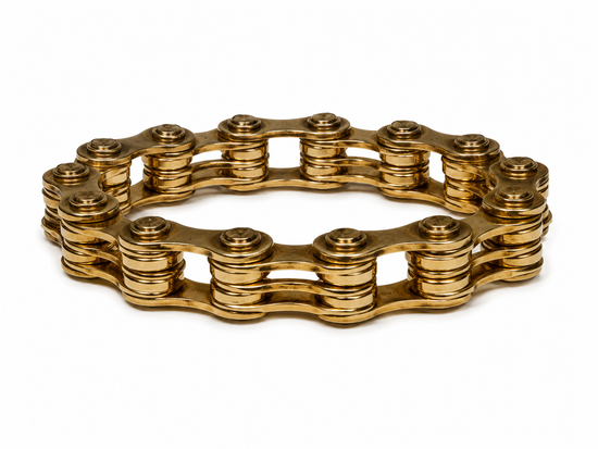 Dior John Galliano bicycle chain bracelet with metallic links, vintage-inspired design, and adjustable clasp.