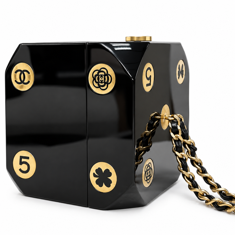 Chanel Plexiglass casino dice minaudière clutch with clear acrylic design and decorative dice accents.