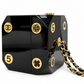 Chanel Plexiglass casino dice minaudière clutch with clear acrylic design and decorative dice accents.