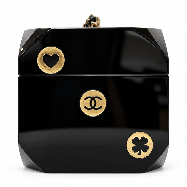 Chanel Plexiglass casino dice minaudière clutch with clear and black dice design, elegant luxury accessory for evening events.