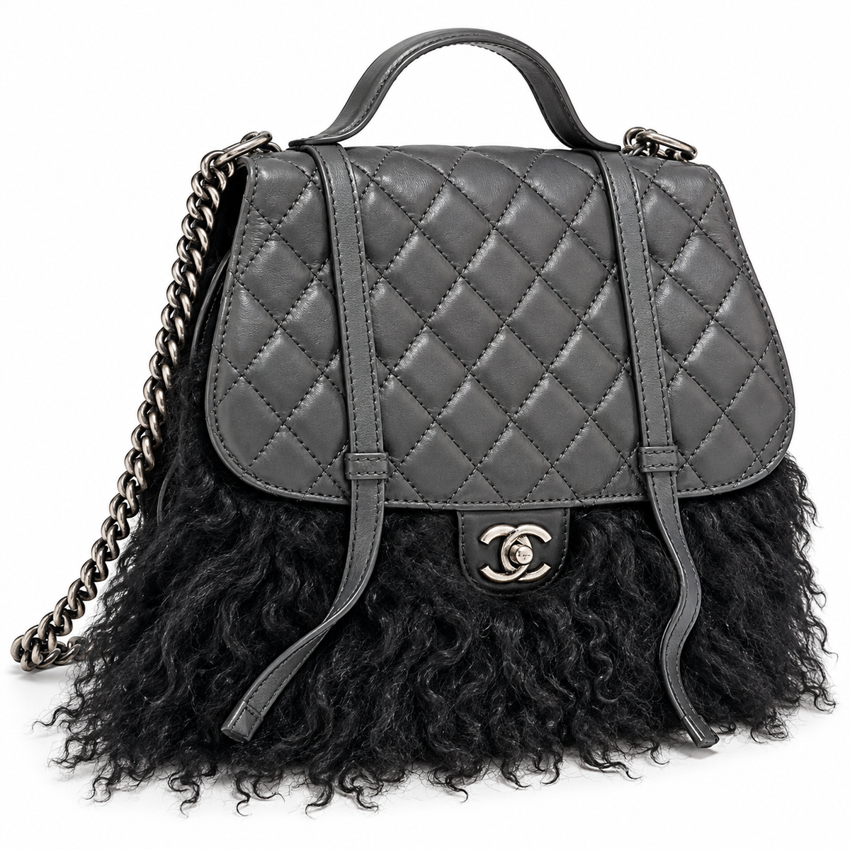 Chanel Paris-Dallas double flap quilted handbag with fur accents, featuring chain strap and classic quilted design.
