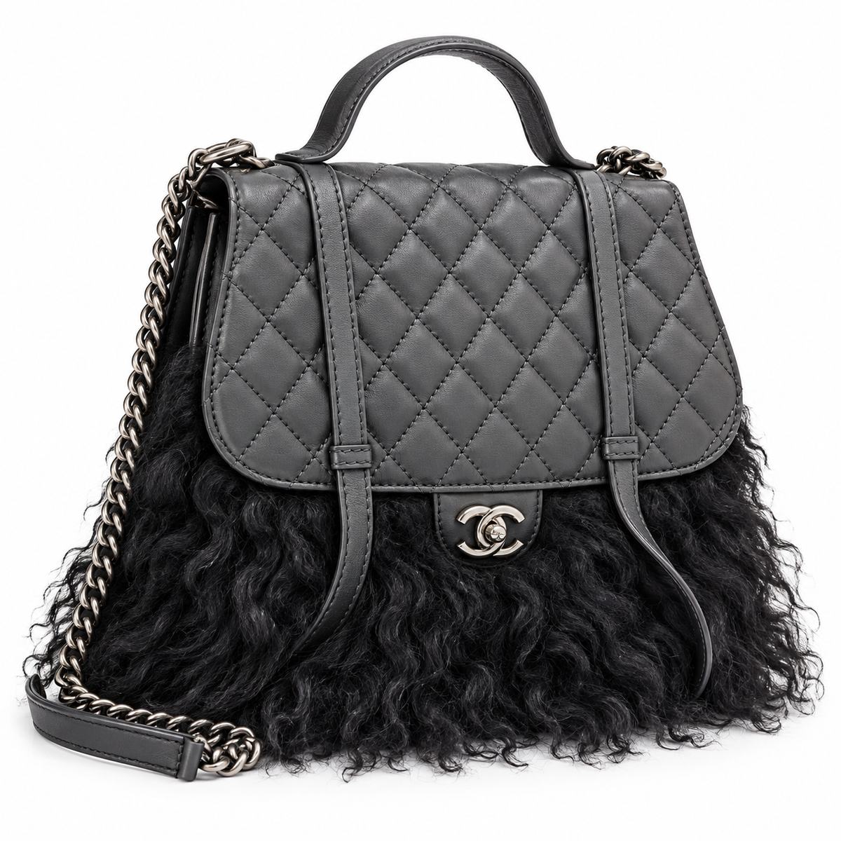 Chanel Paris-Dallas double flap quilted handbag with fur accents, featuring gold chain strap and classic quilted leather design.