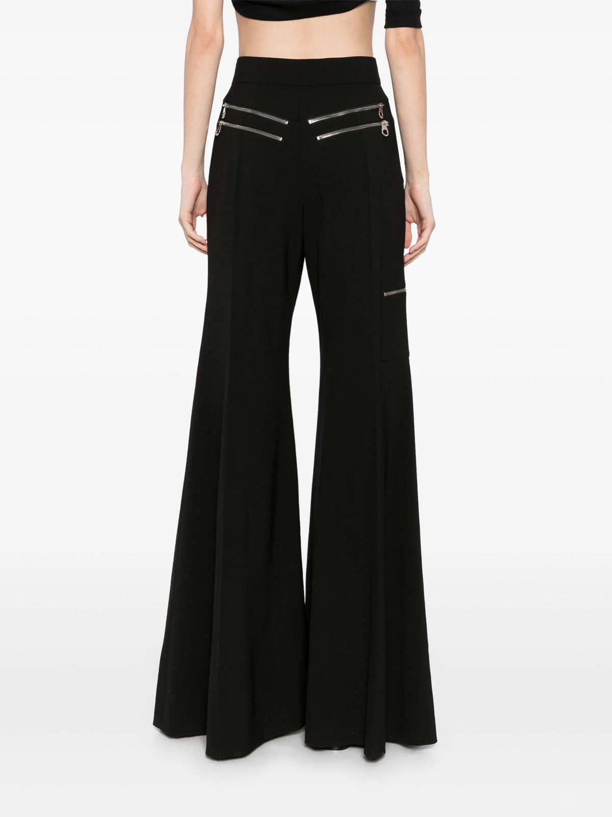 Chloé flared zip trousers featuring high waist, tailored fit, and stylish design, shown in a sleek, modern look.
