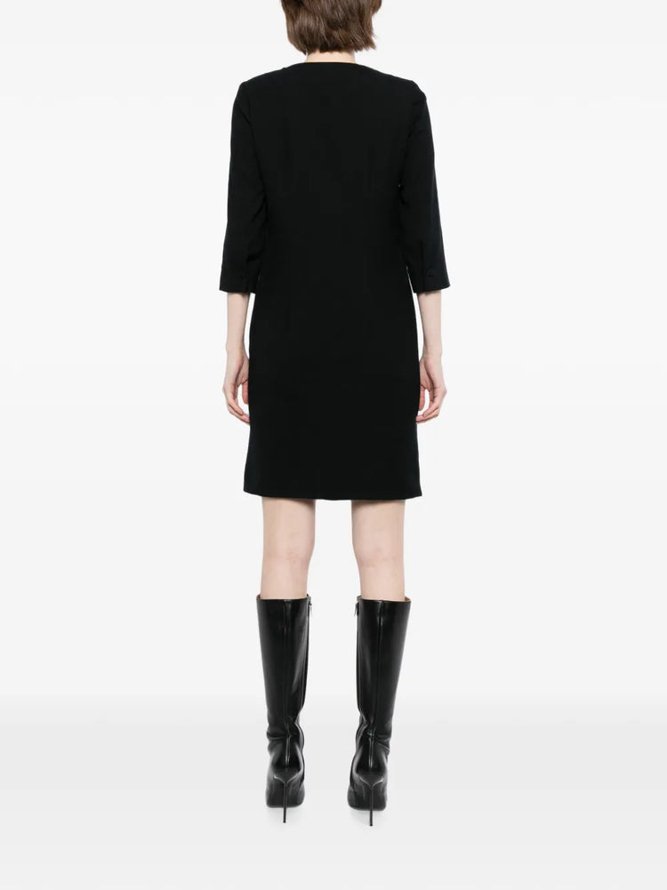 Pre-owned CHLOÉ tailored silk dress displayed on a hanger, showcasing elegant fabric and sophisticated design.