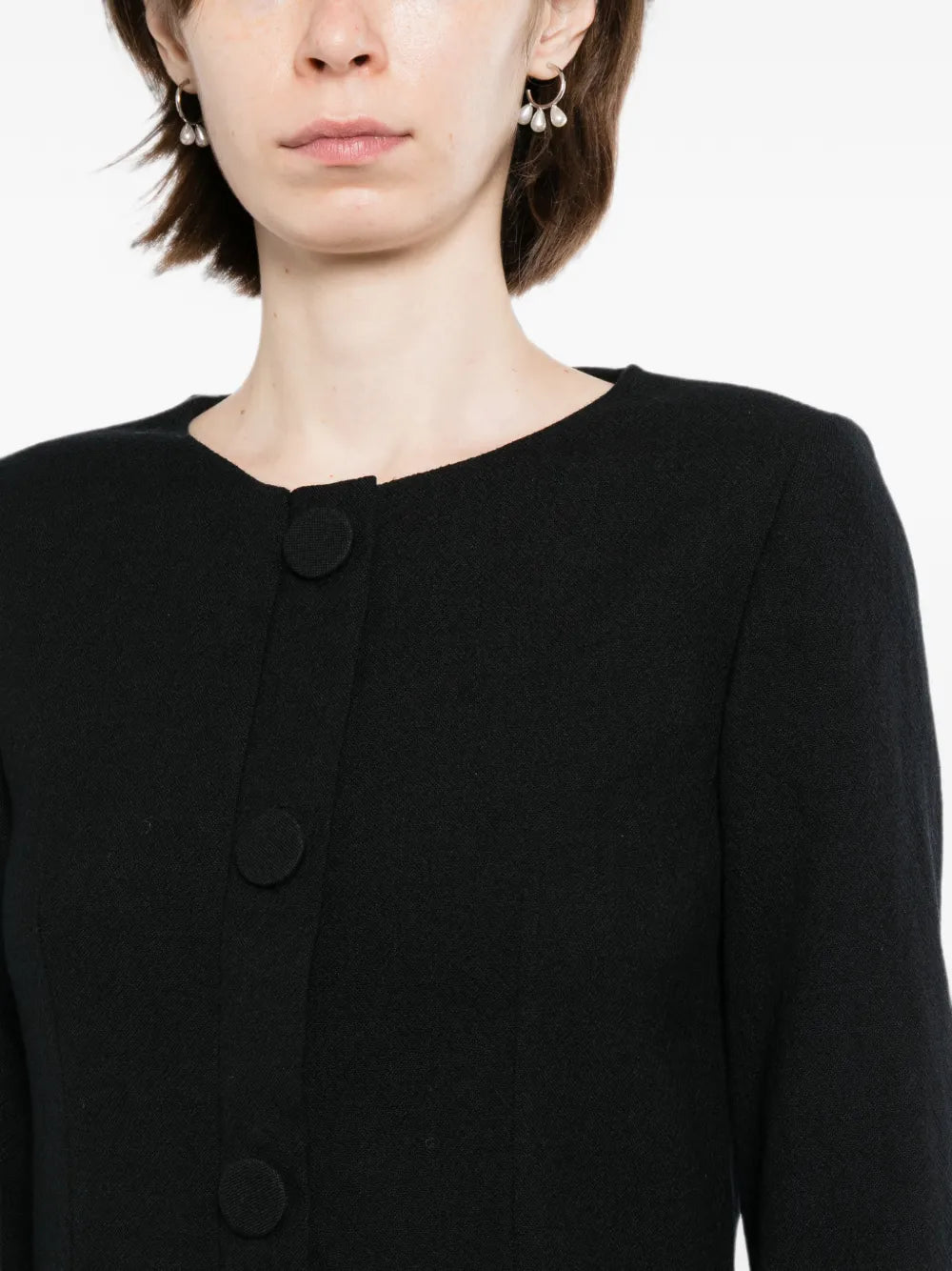 Pre-owned CHLOÉ tailored silk dress displayed on a hanger, showcasing its elegant design and smooth fabric.