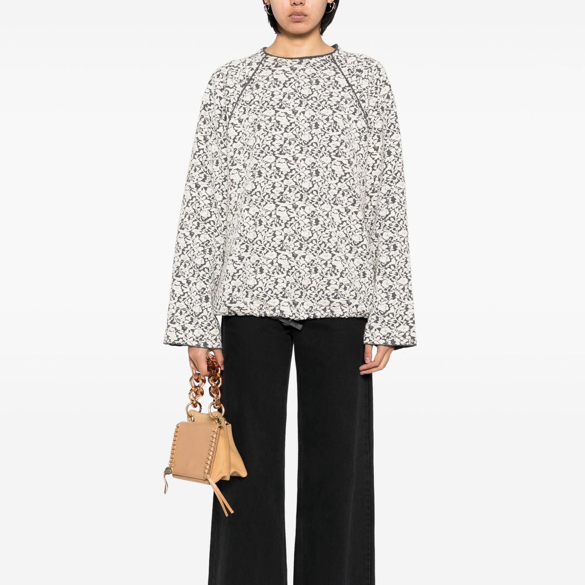 Chloé patterned jacquard wool jumper, a stylish knit top with intricate design and cozy texture, displayed on a neutral background.
