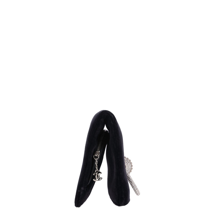 Detail of Chanel velvet clutch crystal-encrusted hoop clasp