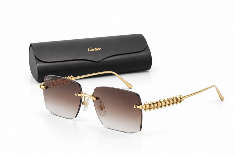 Cartier Clash De Cartier sunglasses with black frames and tinted lenses, displayed inside a sleek black box.