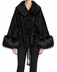 Dior black cuffed jacket displayed on a hanger, showcasing its tailored design and sleek style for modern fashion.
