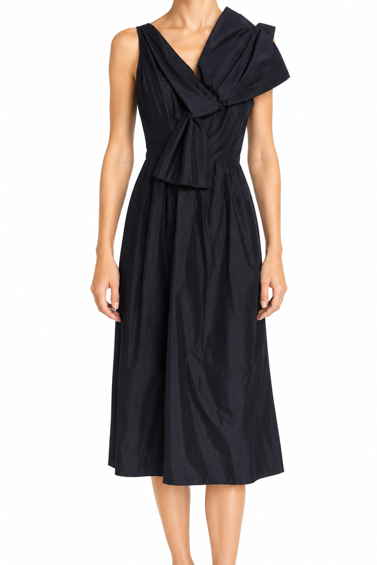 Black Dior maxi dress with elegant bow detail, flowing fabric, and sophisticated design perfect for formal occasions