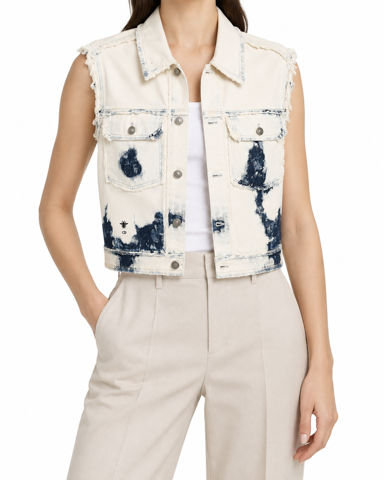 Dior tie-dye denim frayed vest with distressed edges, casual blazer or jacket style, featuring vibrant blue and white patterns.