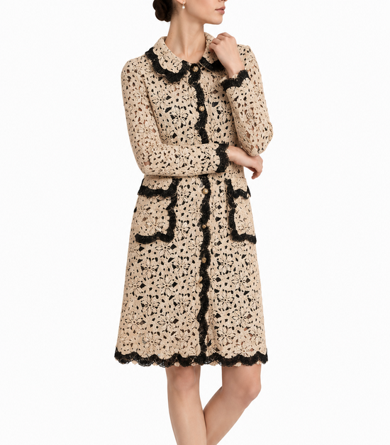 Dolce & Gabbana floral crochet lace coat with intricate lace patterns and elegant design, displayed on a hanger.