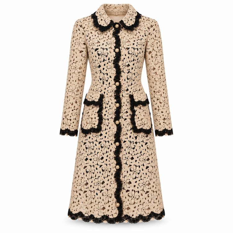 Dolce & Gabbana floral crochet lace coat displayed on a hanger, showcasing intricate lace patterns and delicate floral embroidery.