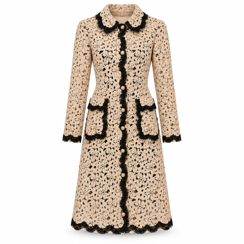 Dolce & Gabbana floral crochet lace coat displayed on a hanger, showcasing intricate lace patterns and delicate floral embroidery.