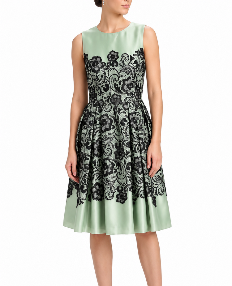 Dolce & Gabbana mint silk dress with floral lace print, elegant and flowing, perfect for sophisticated occasions.