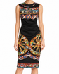 Dolce & Gabbana printed midi dress featuring vibrant patterns, sleeveless design, and a fitted silhouette.