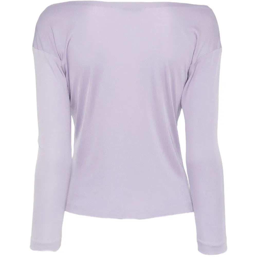 Emilio Pucci lilac silk long-sleeve top with a relaxed fit and elegant drape, displayed on a hanger.