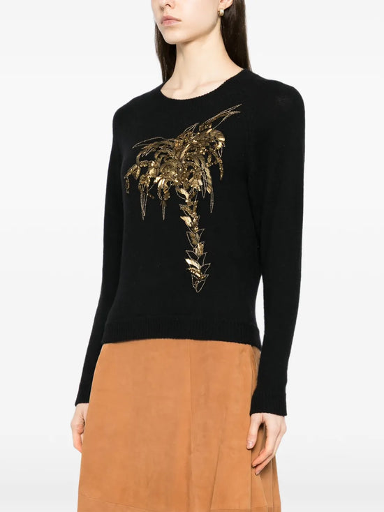 Black knit sweater with gold embellishments from Chloé, featuring a cozy design and elegant detailing for stylish tops.