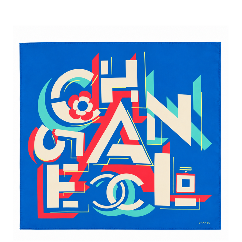 Blue geometric Chanel silk scarf featuring bold pop-art logo and intricate pattern, displayed flat.