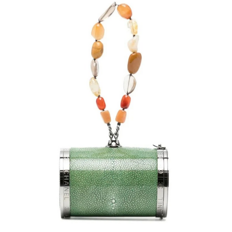 Green Chanel barrel minaudière clutch with sleek design, featuring a compact, elegant style perfect for evening events.