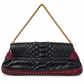 Python shoulder bag with horsebit detail from the 2003 Tom Ford collection, featuring Gucci branding and elegant design.