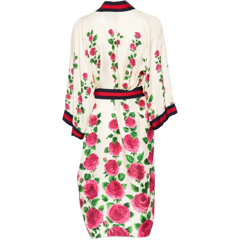 Gucci floral print belted kimono blazer with wide sleeves and tie waist, featuring vibrant floral patterns on lightweight fabric.