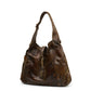 Gucci medium Jackie hobo shoulder bag with signature GG logo and leather strap, stylish and versatile for everyday wear.