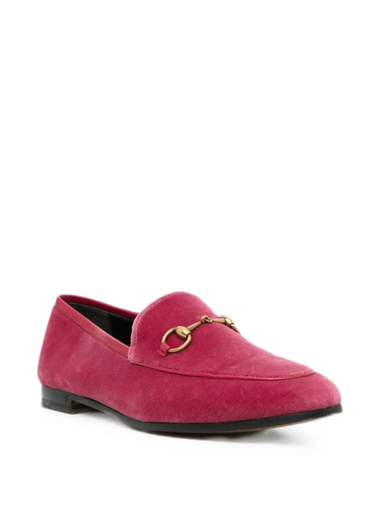 Pink velvet Gucci loafers, stylish slip-on shoes with a luxe finish, featuring a classic design and subtle brand detailing.