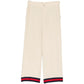 Gucci silk wide-leg trousers with a smooth, flowing fabric and tailored fit, displayed on a neutral background.