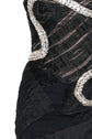 Gucci 2004 black silk crystal-snake dress with intricate details and elegant fit, showcased on a model.