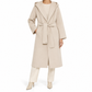 Gucci wool wrap coat hanging on a wooden rack, showcasing its tailored design and luxurious fabric.