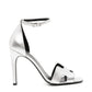 Pre-owned HERMÈS Joy 70 sandals with tan leather straps and elegant design, displayed on a neutral background.
